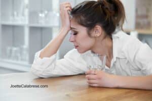 Portrait of woman with headache